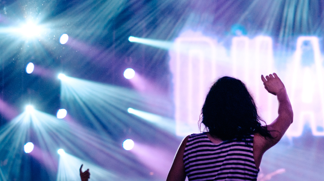 party-light-and-party-goer-behind-shot